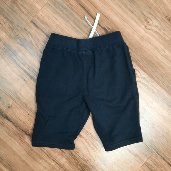 UA Youth Small Fitted Black Sweatshorts w/ emblem - Picture 2 of 3